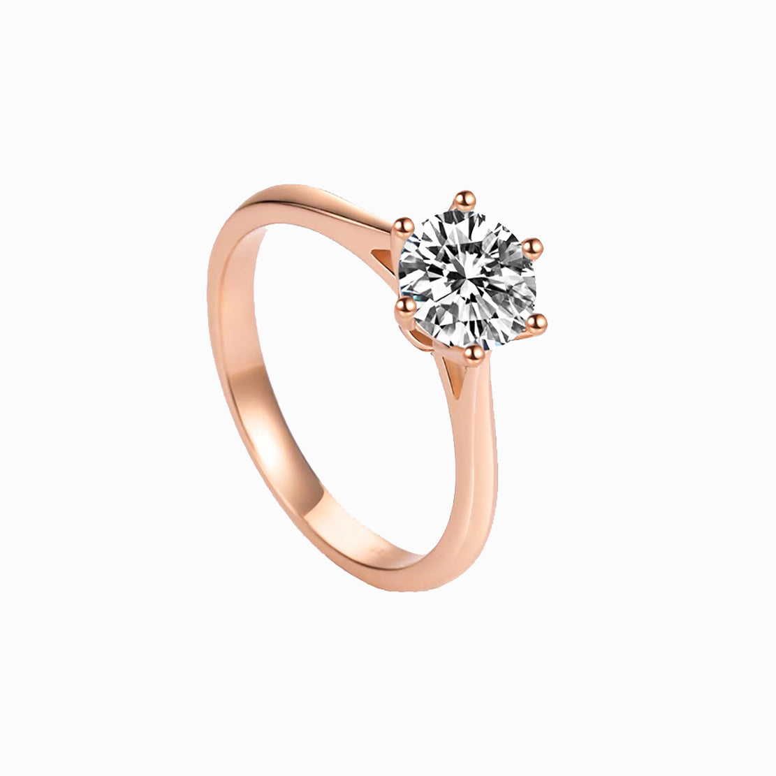 a rose gold ring with a single diamond