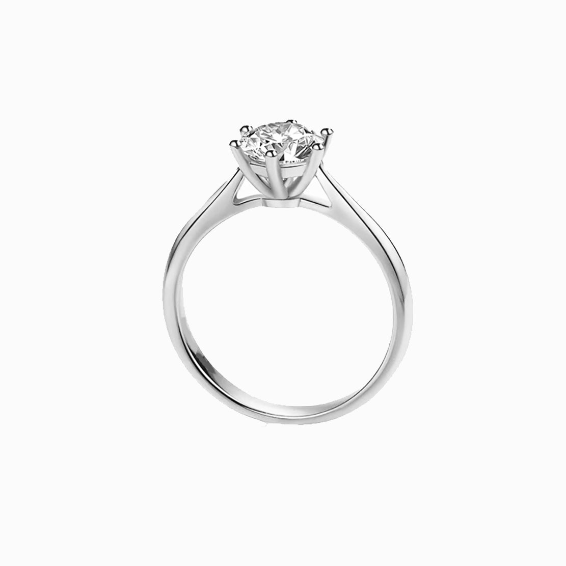 a white diamond ring on a white background