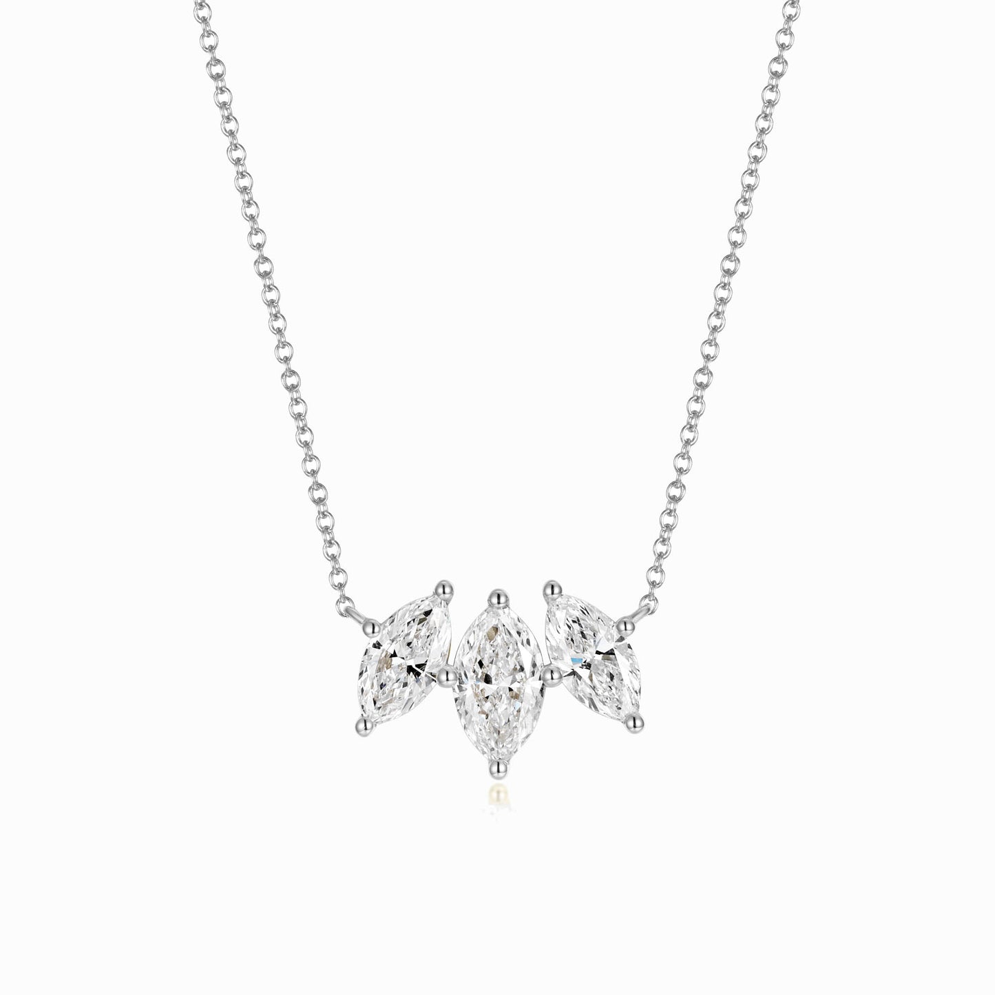 a necklace with three pears hanging from it