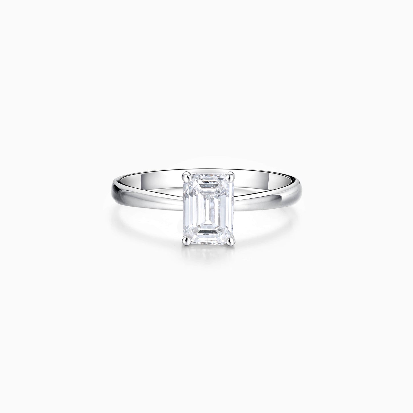 a white diamond ring on a white background