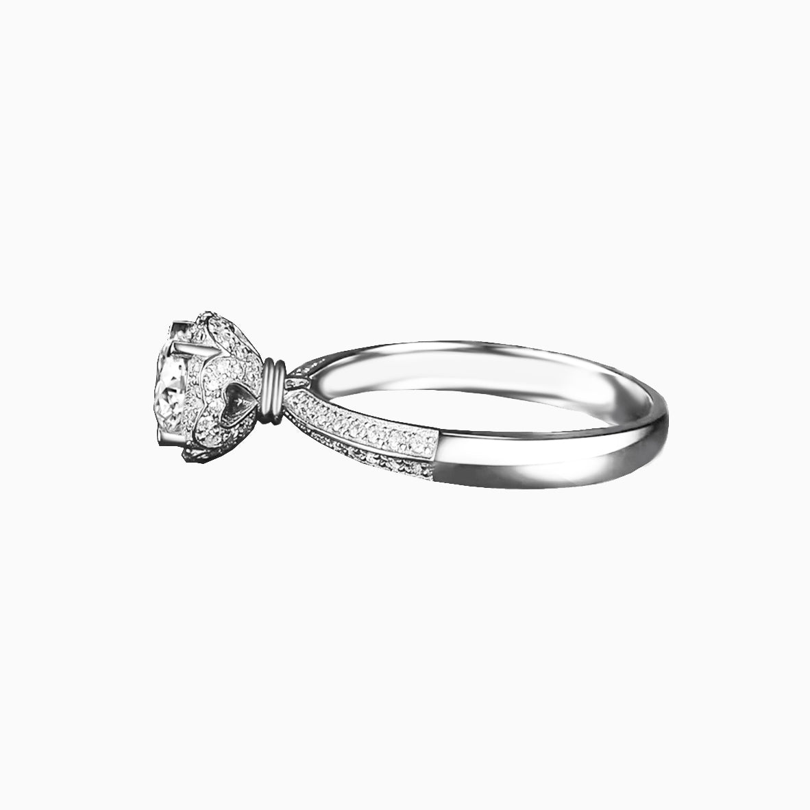 a diamond ring with a bow on top of it