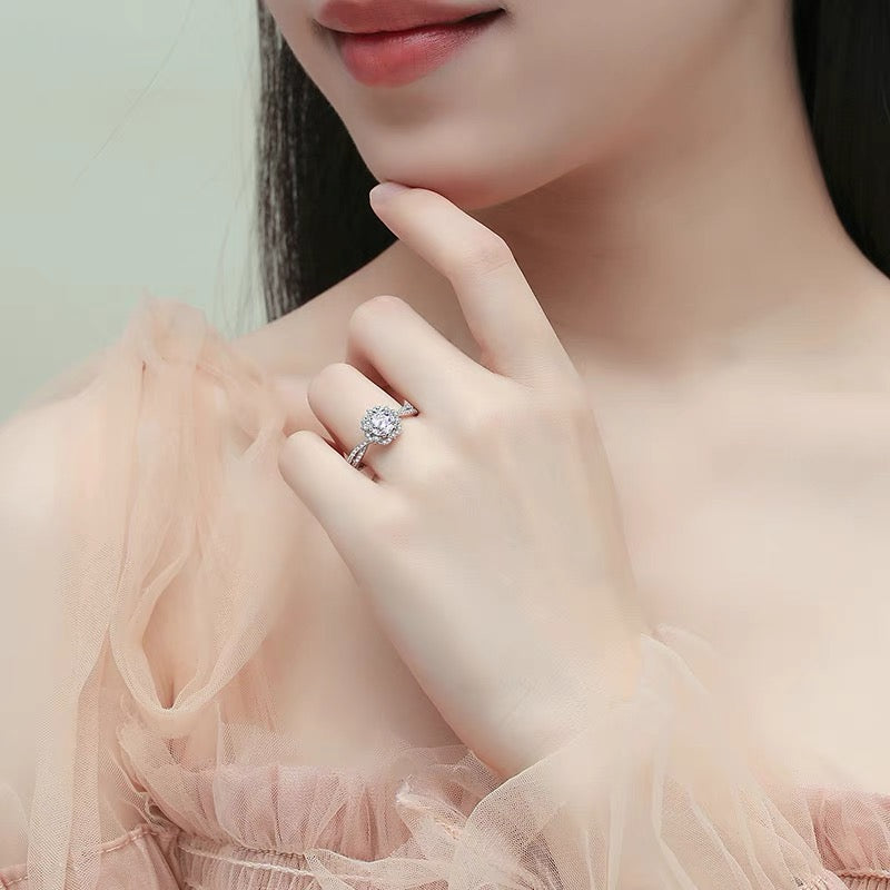 a close up of a person wearing a ring