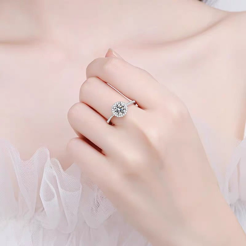 a close up of a person wearing a ring