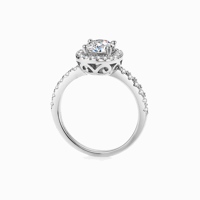 a white gold ring with a diamond center