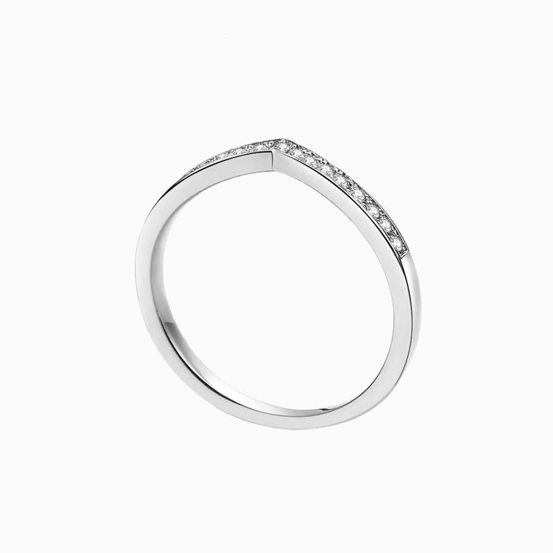 a white gold ring with diamonds on it