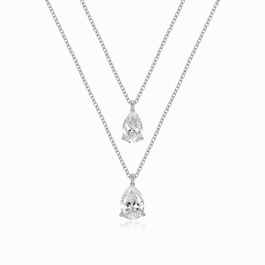 two necklaces with two pear shaped diamonds