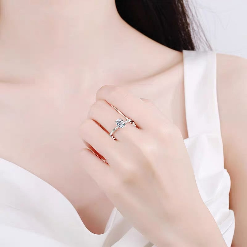 a close up of a person wearing a ring