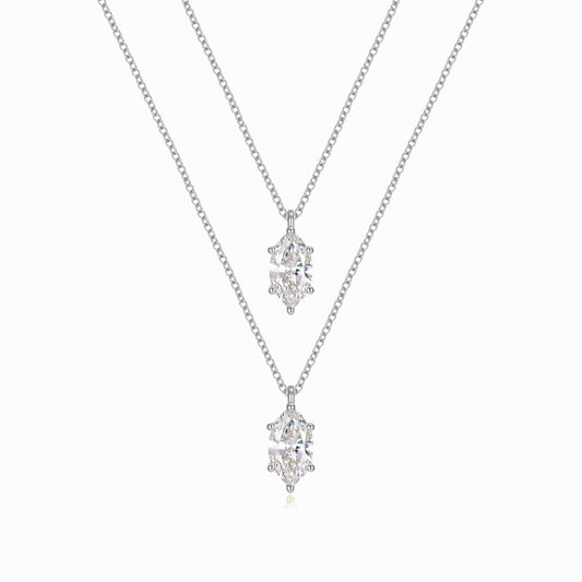 two necklaces with diamonds on a white background