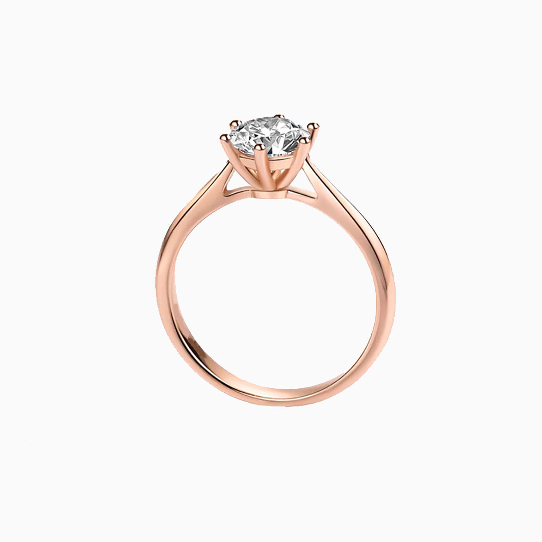 a rose gold engagement ring with a single diamond